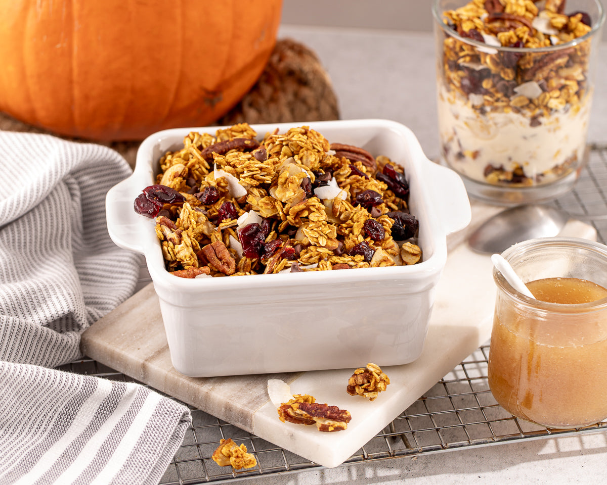 easy homemade granola clusters with pumpkin and apple, served with yogurt and honey