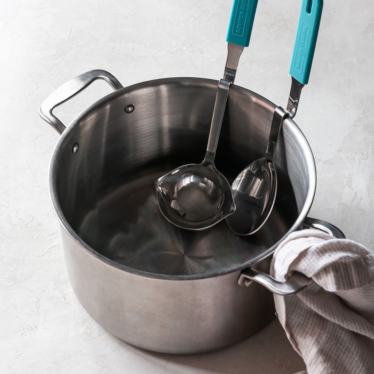 Souper Cubes serving utensils in a pot