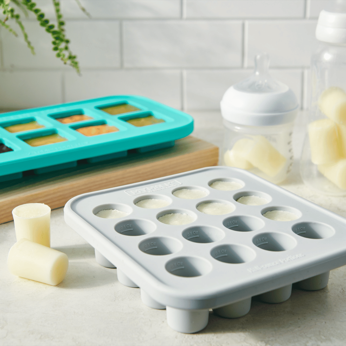 Silicone mold for freezing breast milk on a kitchen counter