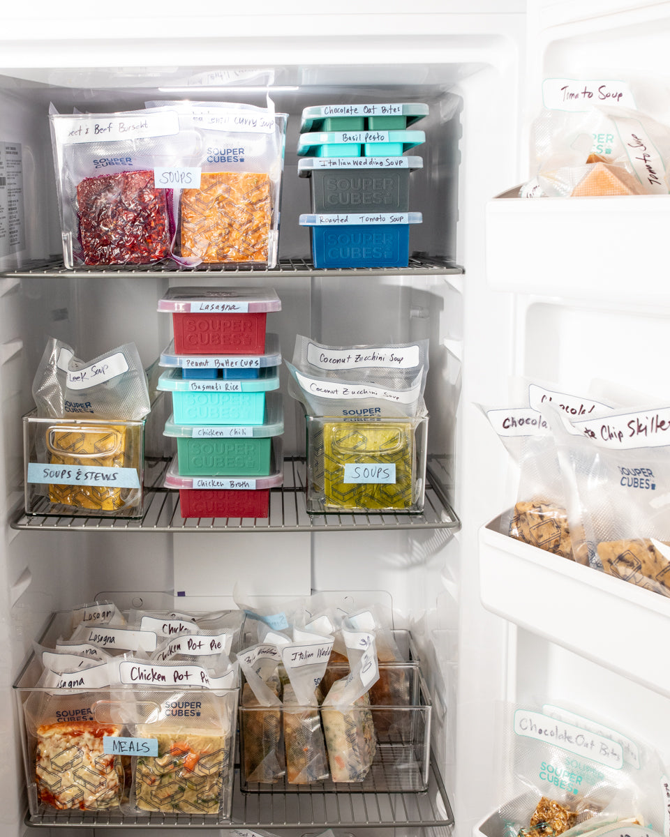 Freezer full of meal prep in Souper Cubes vacuum seal bags and bin system