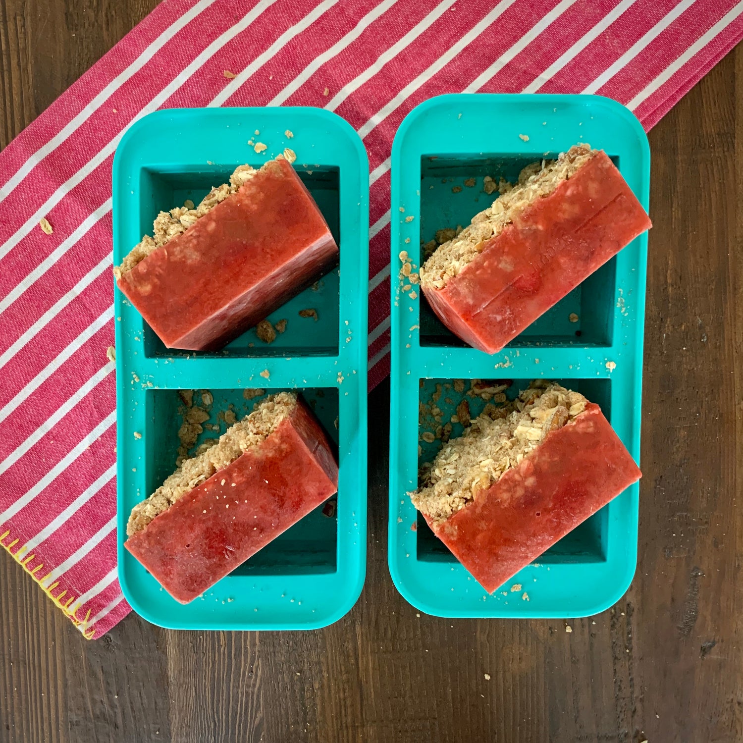 image of 4 mini strawberry rhubarb crisps frozen in 2cup souper cubes trays