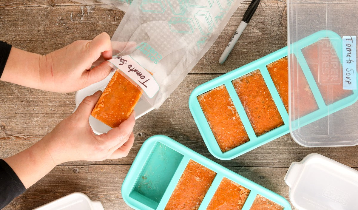 Tomato soup cubes going into vacuum seal bags